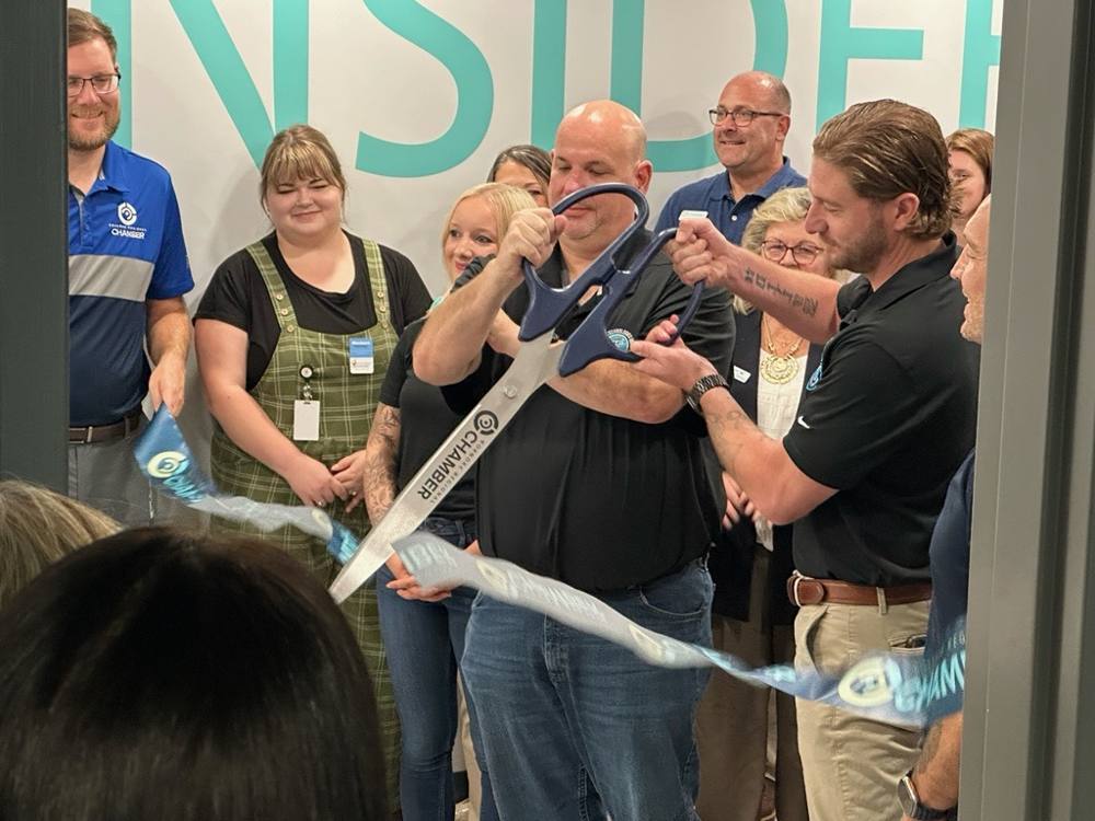 Cutting the ribbon at the Tight Technologies expansion